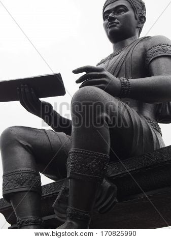 A statue of the great historic king Ramkhamhaeng in Sukhothai Historic Park in Thailand.
