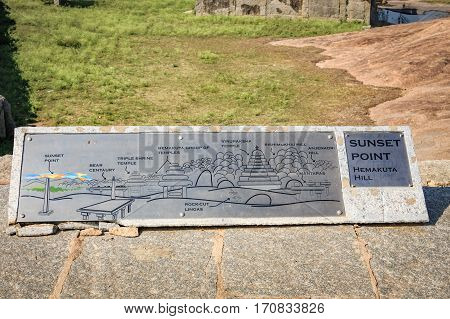 Hampi, India - November 20, 2012: Vintage sign located on the Hemakuta Hill Sunset Point in Hampi, India
