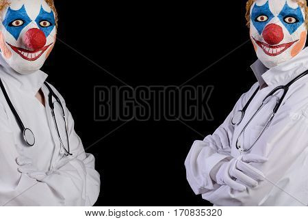 Do not diligent doctor in clown mask on a black background. Deception in the treatment of