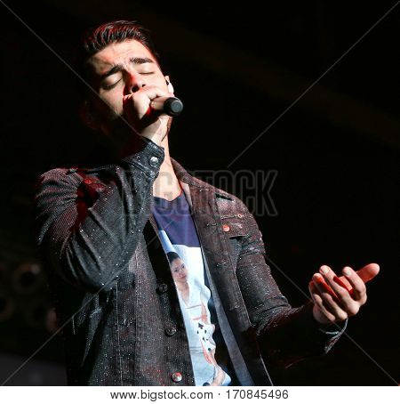 HUNTINGTON, NY-FEB 8: Joe Jonas of DNCE performs onstage at the Paramount on February 8, 2017 in Huntington, New York. 
