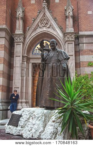 ISTANBUL, TURKEY - OCTOBER 6, 2014: Monument to St. Antuan near Church, alternatively known as the Sant'Antonio di Padova Church in Istanbul, Turkey