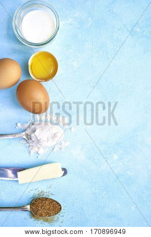 Ingredients For Baking - Eggs,flour,sugar,butter,milk.top View With Space For Text.