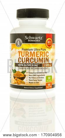 Winneconne WI - 12 February 2017: Bottle of Schwartz turmeric curcumin capsules on an isolated background.
