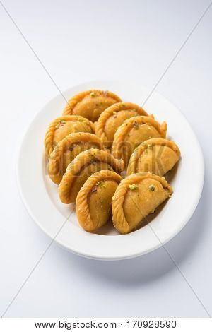 Gujiya - sweet dumplings made during the festival of holi and diwali, selective focus
