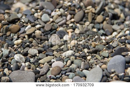 smooth stone cover pattern of pebble stones on the beach