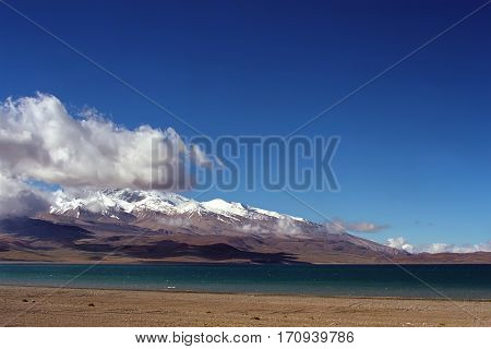 On the shore of sacred Rakshastal lake (4541 m) near Gurla-Mandhata Mount (7694 m) in Western Tibet.
