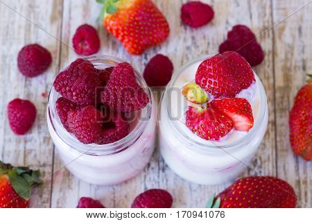 Homemade yogurt with sweet strawberries and raspberries