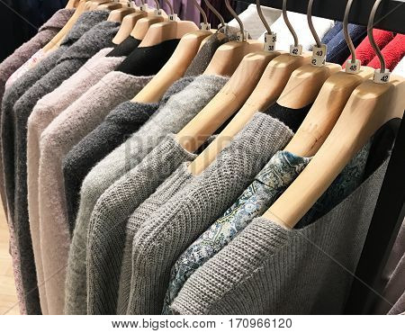Cardigan on a clothes rack for winter closing