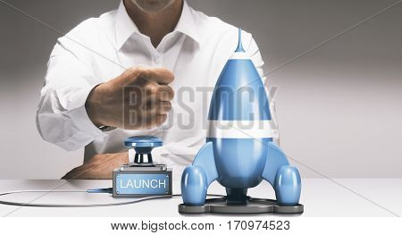 Man about to launch a rocketship. Advertising concept of company startup or business boost. Composite between a 3D image and a photography background.