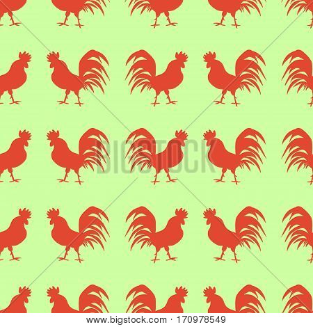 Seamless pattern with red roosters on green background.