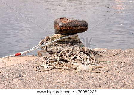 Rusty Metal Mooring Bolard For Big Ship