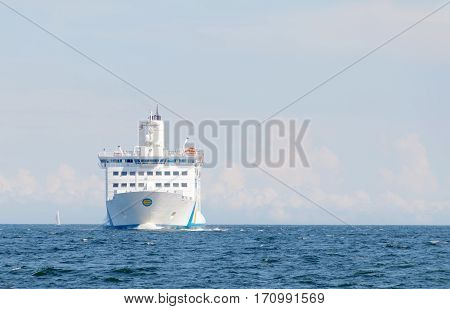 GRISSLEHAMN SWEDEN - JUL 12 2016: Passenger ferry rocky coastline and blue sea in the swedish archipelago. July 12 2016 Grisslehamn Sweden