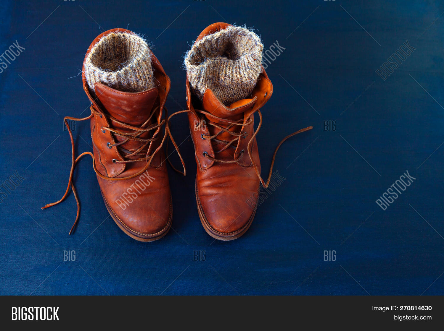 old school hiking boots with red laces