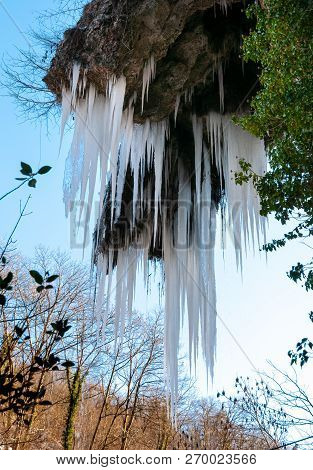 Stalactites in the Caves of Valganna in frosty winter day, province of Varese, Italy