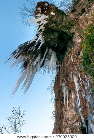 Stalactites in the Caves of Valganna in frosty winter day, province of Varese, Italy