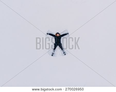 Drone Top View Snow Angel Man In December