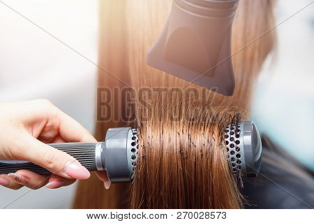 Close-up Blow Drying For Brushing. Salon Spa Treatment Of Keratin Straightening And Restoration Hair