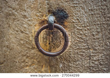 Door Handles With An Old Double Door. Golden Handle Door Entrance. Luxury Gold Handle. Classical Sty