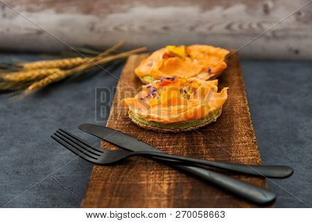 Asparagus salmon tartlets chiffonade, pickled vegetables, creamy creamy