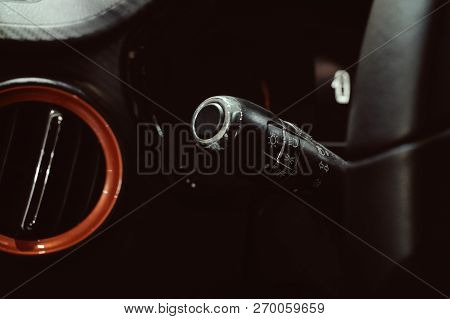 Close Up Car Steering Wheel With Wipers Control Buttons. Car Rain Windscreen Wiper Control Stick. Ad