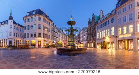 Stork Fountain On The Amagertorv Square, Stroget Street During Morning Blue Hour, Copenhagen, Capita