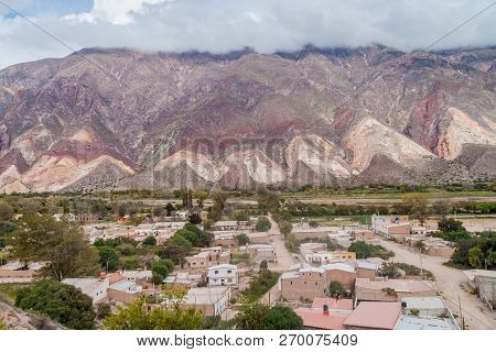 Village Maimara Under Colorful Rock Called Paleta Del Pintor Painters Palette In Quebrada De Humahua