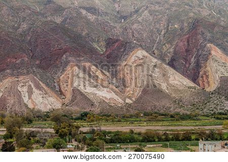 Village Maimara Under Colorful Rock Called Paleta Del Pintor Painters Palette In Quebrada De Humahua
