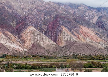 Village Maimara Under Colorful Rock Called Paleta Del Pintor Painters Palette In Quebrada De Humahua