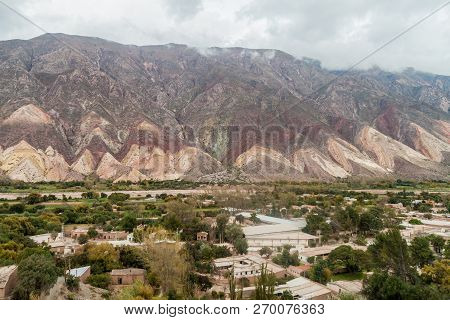 Village Maimara Under Colorful Rock Called Paleta Del Pintor Painters Palette In Quebrada De Humahua