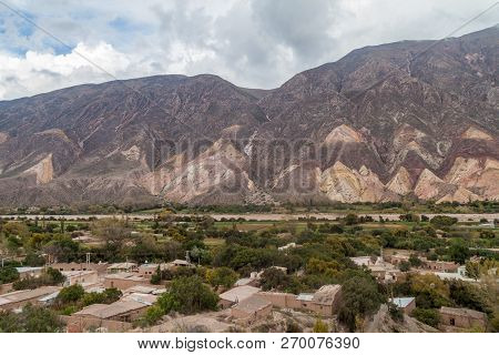 Village Maimara Under Colorful Rock Called Paleta Del Pintor Painters Palette In Quebrada De Humahua