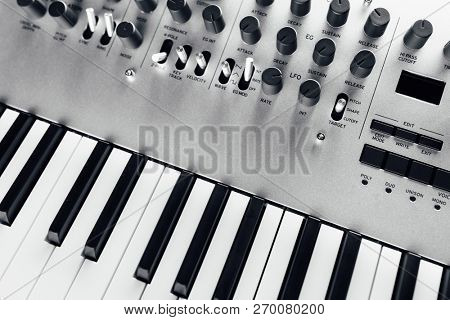metallic analog synthesizer, close-up view