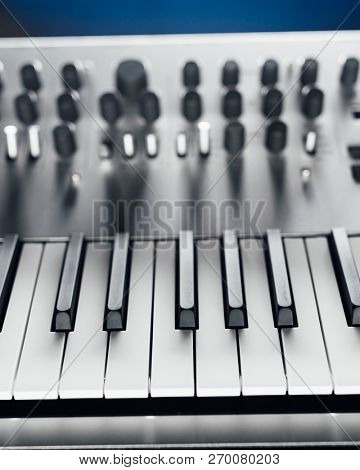 metallic analog synthesizer, close-up view