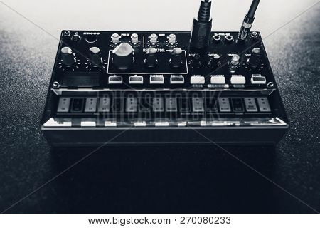 black analog synthesizer, close-up view