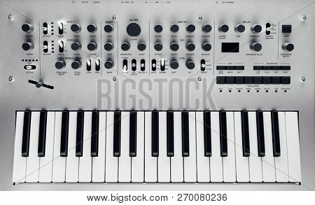 metallic analog synthesizer, close-up view