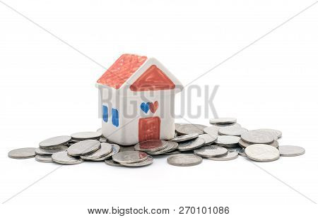 House And Coins On White Background,  Finance Cion Concept