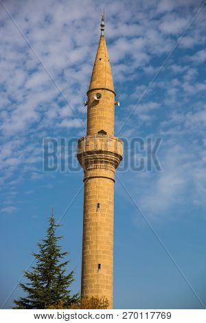 Cappadocia, Turkey: Mosque Minaret On Blue Sky Background