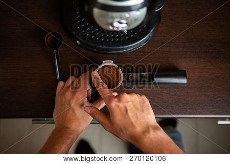 Image Of Coffee Maker, Human Hand Pouring Coffee In Kitchen