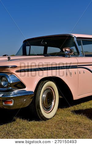 Pekin, North Dakota, September 2, 2018: A Classic Edsel Pink Ford Car From The Late 50`s Is Parked F