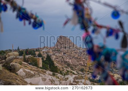 Evil Eye In Tree Behind Uchisar Castle In Cappadocia, Uchisar, Turkey.