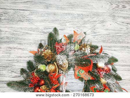 Christmas Background - Beautiful Handmade Wreath Close-up On A Vintage Wooden Background.