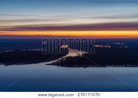 Beautiful River With Big Island With Trees Under Predawn Sky. Bright Yellow Stripe In Picturesque Cl