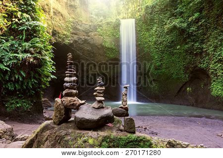 Stacked Zen Stone At Tibumana Waterfall In Ubud Bali Indonesia.