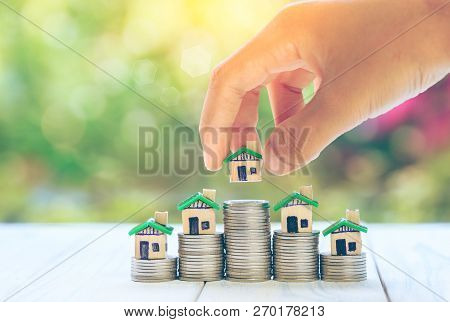 Money Of Coins To Buy A Home Concept Concept For Property Ladder,