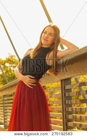 Young Slim Woman With Long Brown Hair Dancing