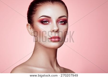 Beautiful Young Woman With Clean Fresh Skin. Perfect Makeup. Beauty Fashion. Eyelashes. Cosmetic Eye