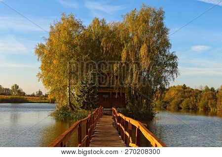 Scenic View Of Old Abandoned House In The Middle Of The Lake. Autumn Morning Landscape. Village Of O