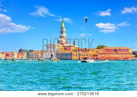 View On Guidecca Island With Its Church And Boats, Venice, Italy