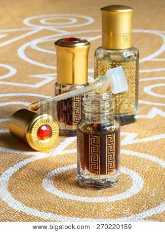Arabian Oud Attar Perfume Or Agarwood Oil Fragrances In Mini Bottles.