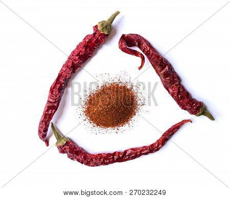 Dried Red Chili Pepper Isolated On White Background. Desiccated Milled Paprika. Top View Flat Lay. S