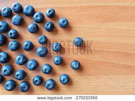 Fresh Blueberry On A Wooden Table. Top View. Fresh Bilberry Closeup. Flat Lay View. Stock Image.